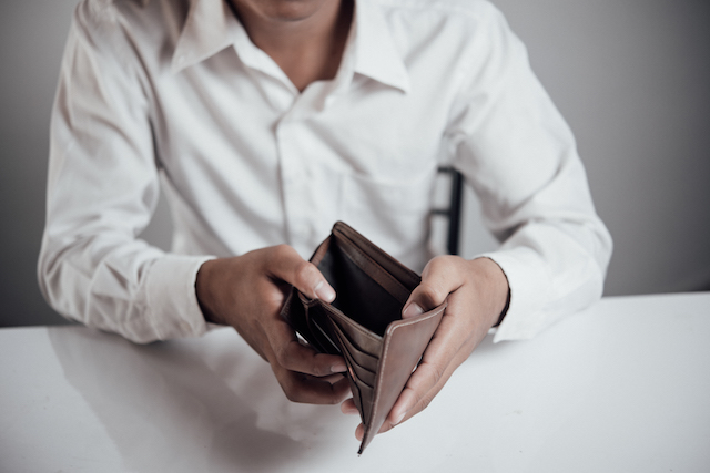 Man Holding Fake Empty Wallet to Carry For Vacation