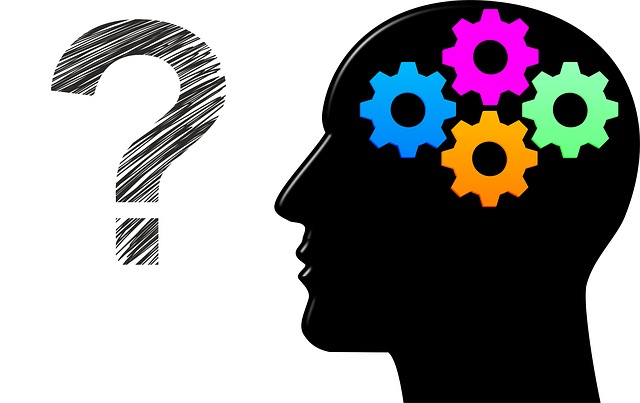 Brain gears working to produce a memory, result in a question mark.