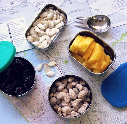 Snacks organized in small containers.
