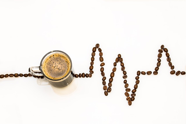 coffee with beans shaped in a heart beat. 